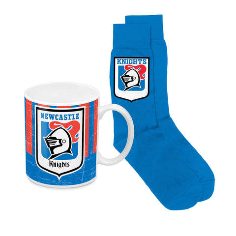A Newcastle Knights themed gift set featuring a white ceramic mug and a pair of royal blue crew socks, both printed with the club's crest.