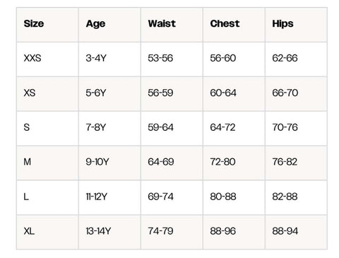 A size chart table showing measurements for XXS through XL by age, waist, chest, and hips, with a light beige background and black text.