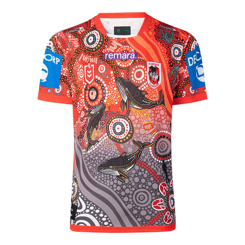 A short-sleeve rugby jersey with a vibrant Aboriginal-inspired dot art pattern featuring red, orange, gray, black, and white, with two whales and the 'remara' sponsor logo on the chest.